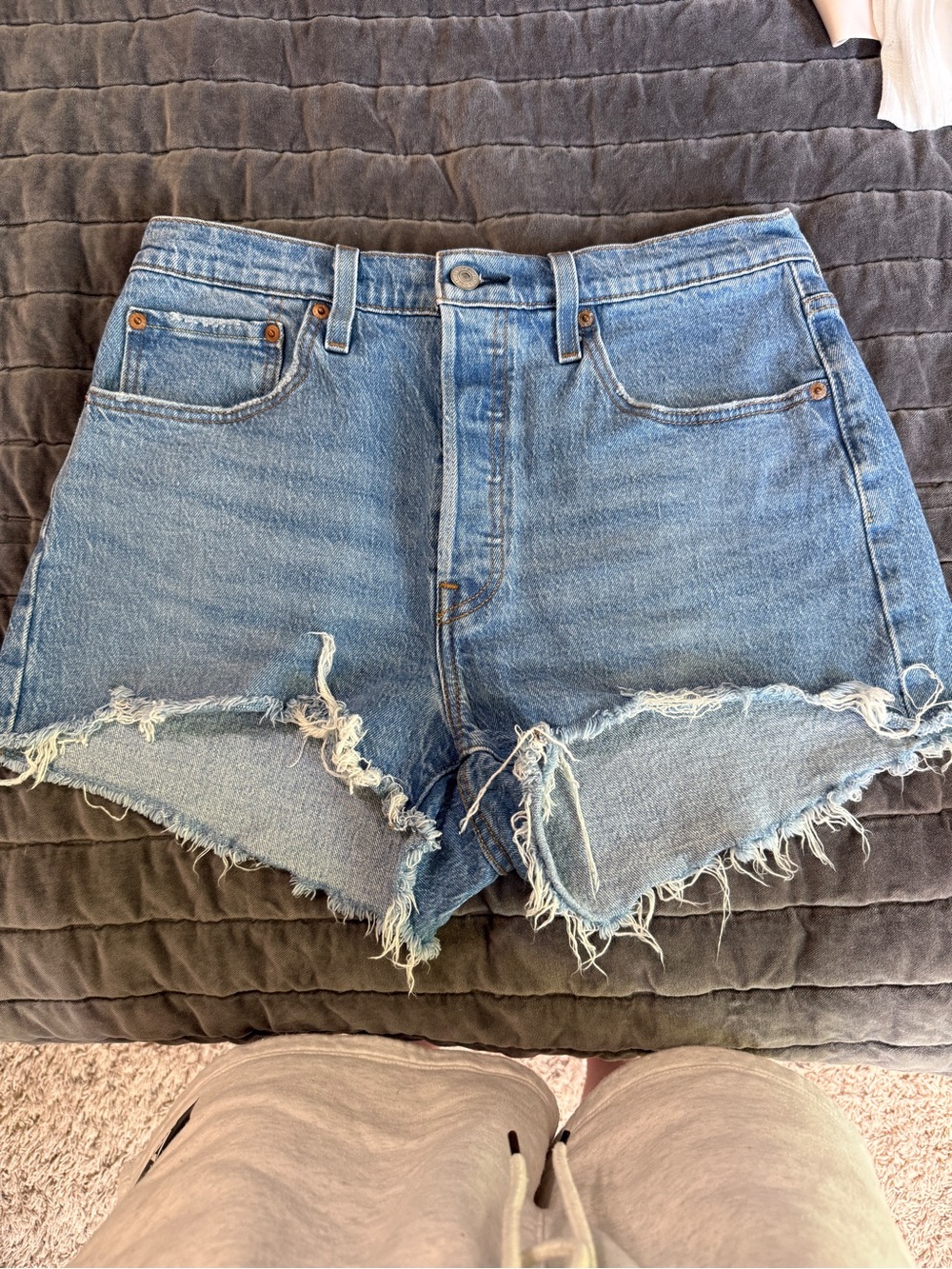 Levi 501s High-Waist Distressed Denim Shorts - Light Blue